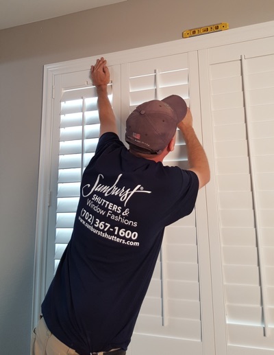 Shutter installation in New Brunswick bedroom.