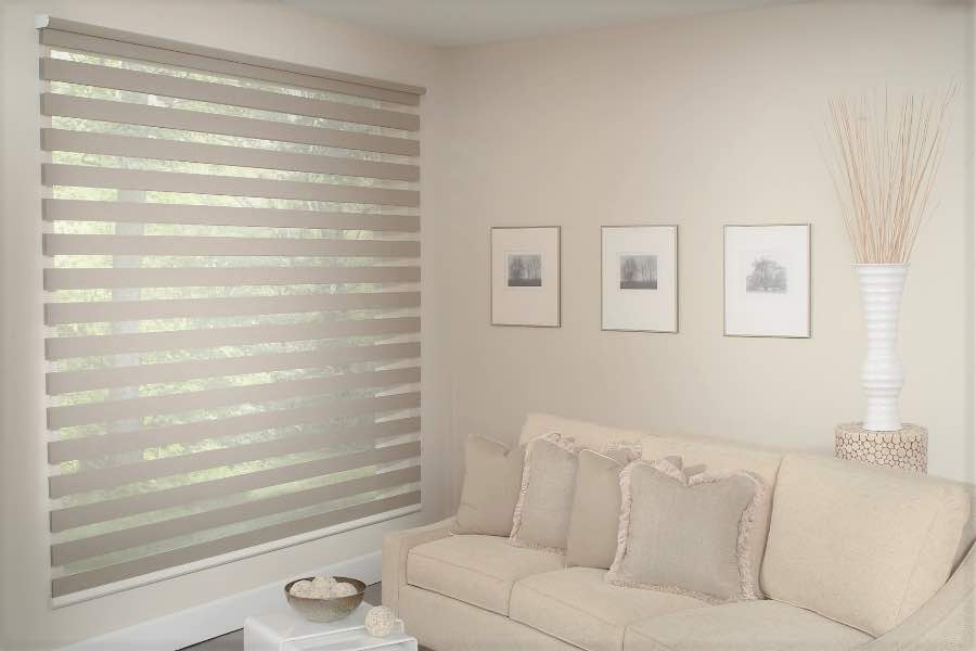 Zebra shades give you a unique combination of light control and style that benefits your New Brunswick home. Zebra shade allows filtered light into a living room