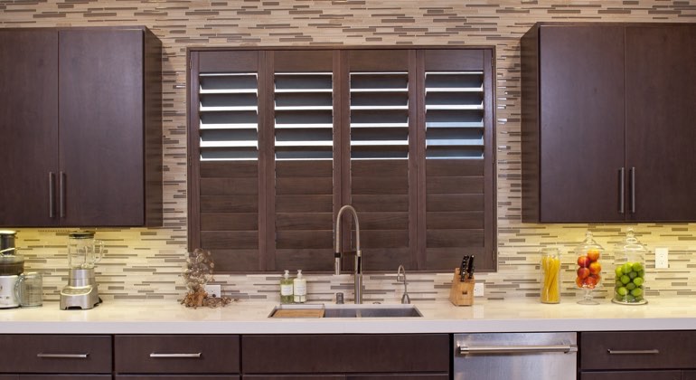 Divider rail shutters in a New Brunswick kitchen. New Brunswick cafe kitchen shutters