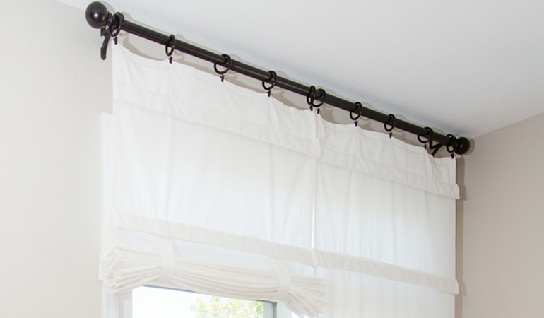 Tumble shades in New Brunswick give your doors privacy versatility and style. White tumble shade on double glass doors